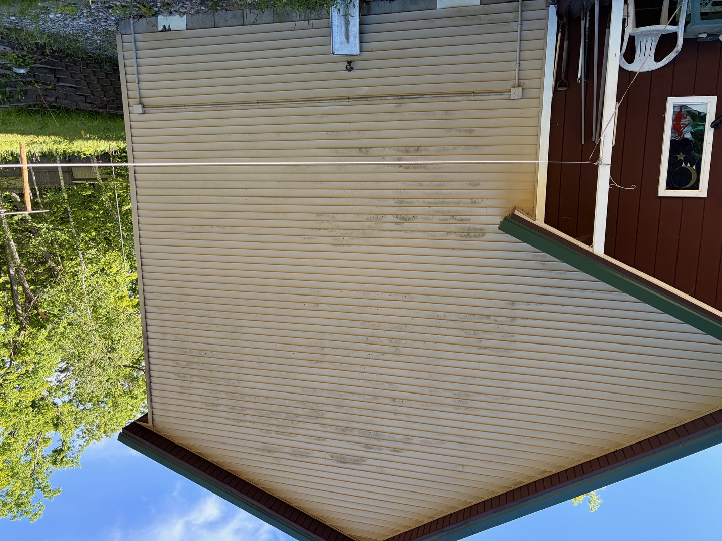 Dirty house siding before washing